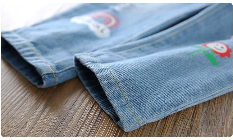 Зимние штаны для маленьких девочек джинсовые плотные с мультяшным рисунком