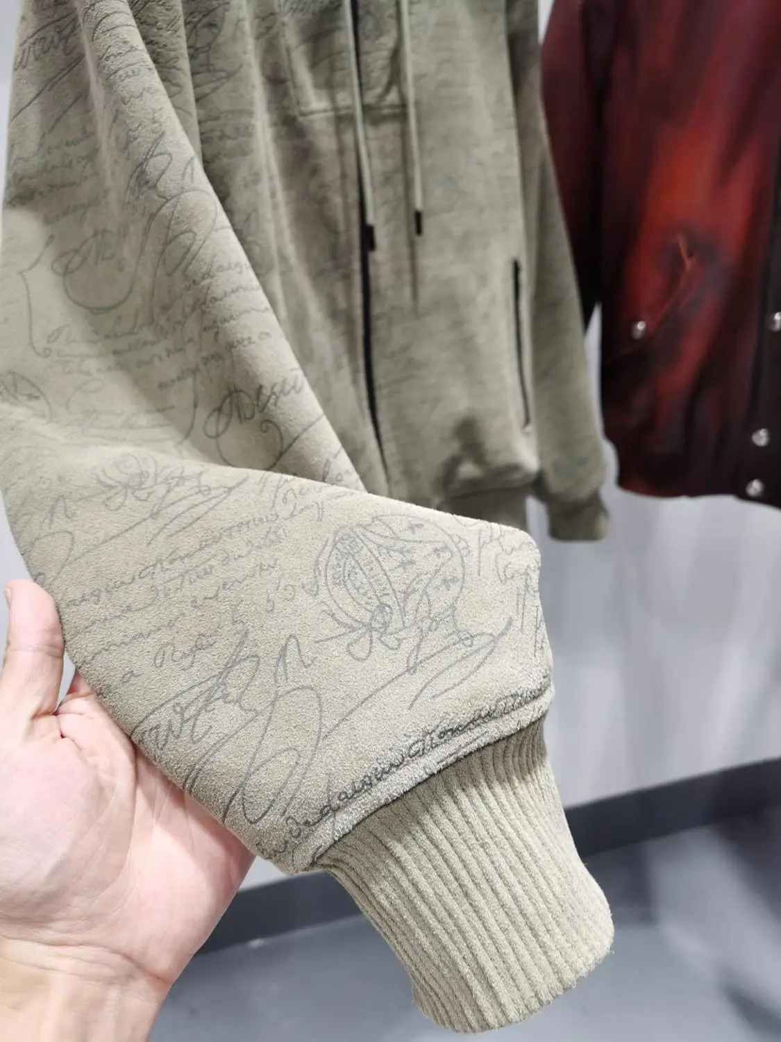 

ANDONAIMI high-quality custom high-quality sheepskin suede fabric warm and windproof hooded jacket laser printing