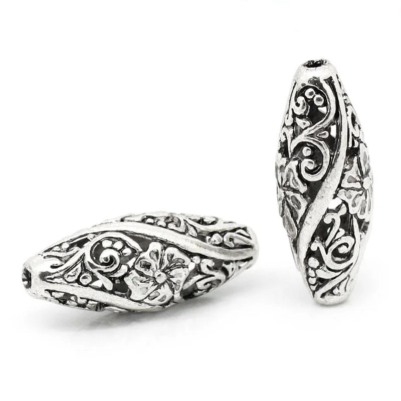 

DoreenBeads Zinc Alloy Filigree Spacer Beads Oval Antique Silver Color Flower Hollow Carved DIY Jewelry About 26mm x 11mm,10PCs