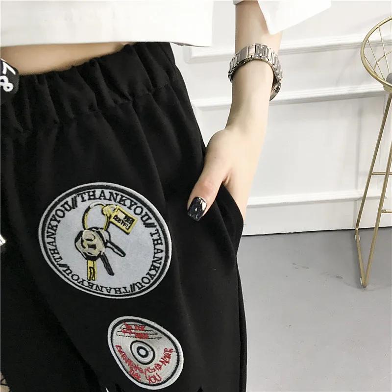 

Oversized loose hip hop streetwear trousers big hole sweatpants badge patchwork leisure pants ladies spring cotton pants women