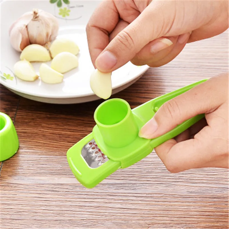 

1PCS Kitchen Accessories Garlic Press Mini Grinding Grater Garlic Crusher Peeler Kitchen Tool Kitchen Garlic Presses Gadgets