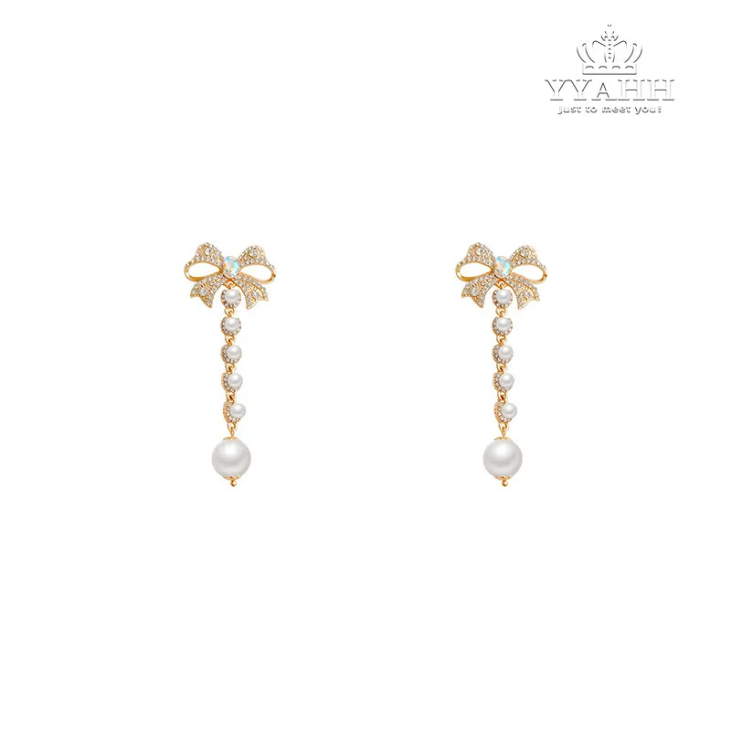 

Korean Version of Super Fairy Bow-tie Earrings Female, Long Full of High - Grade Feeling Earrings Exaggerated Earrings