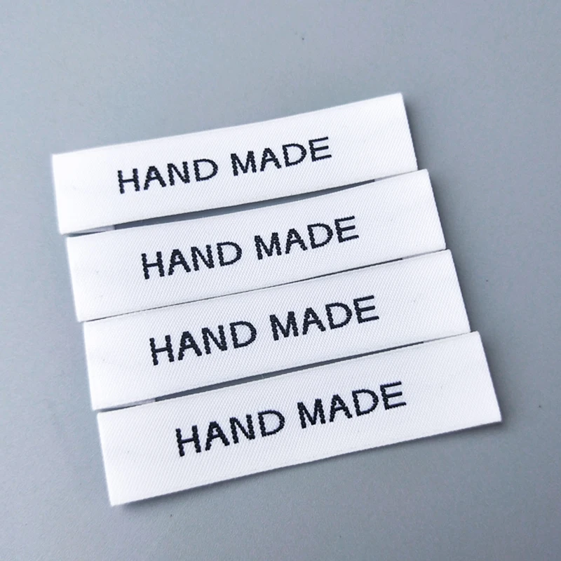 Высококачественная повязка на руку для пальто ручной работы белом фоне с черным