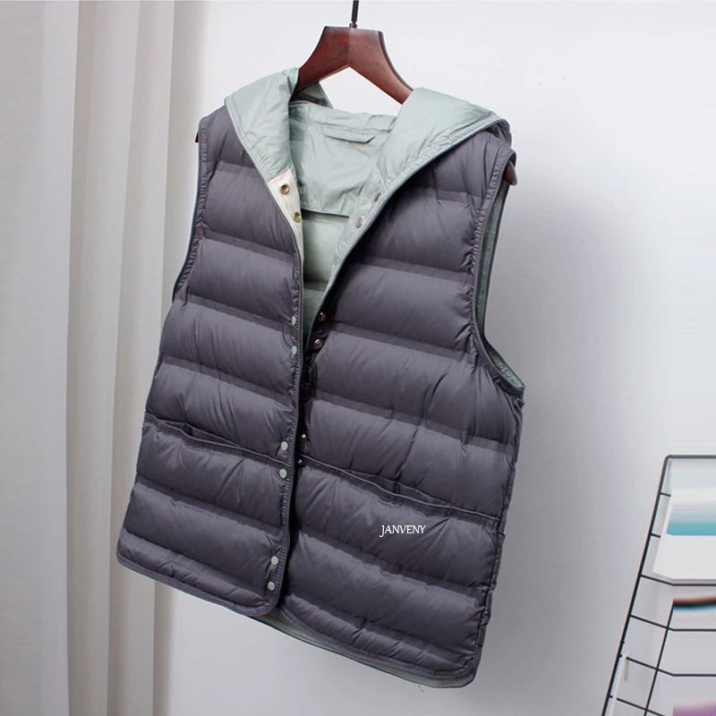 Женский пуховой жилет ультрасветильник с капюшоном карманами бесшовный