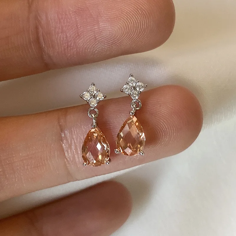 

S925 whole body sterling silver light orange drop zircon earrings simple and compact temperament cold style earrings