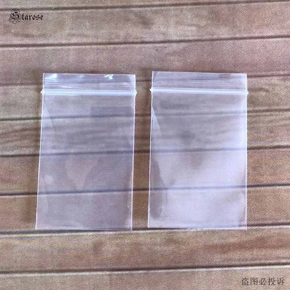 

Starose, 100 шт./лот, новые 4x6 см, прозрачные сумки с застежкой-молнией и принтом, упаковка для ювелирных изделий на удачу, сумка на молнии, водонепроницаемая пластиковая герметичная сумка