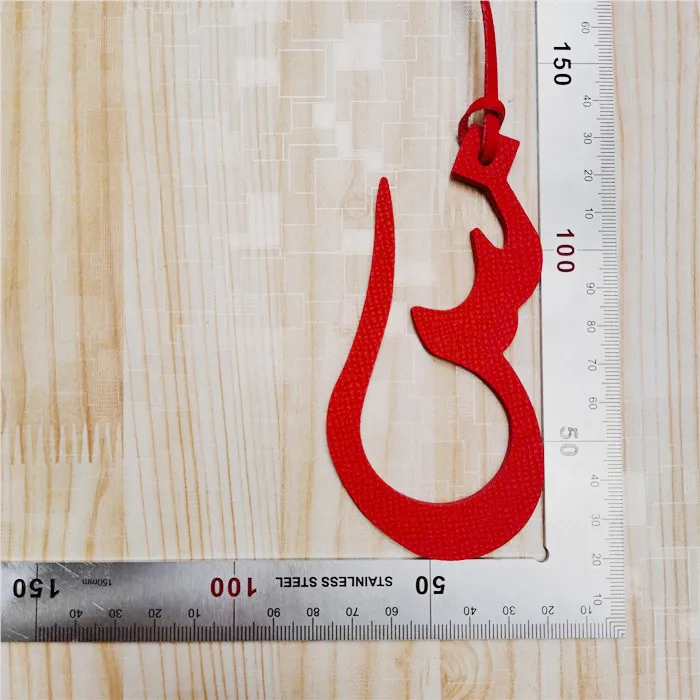 

Wholesale Custom Made Genuine Natural Leather Character Alphabet Arabic Letter Keychain Backpack Pendant Ladies Women Bag Charm