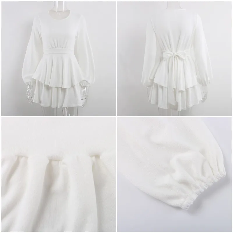 Женское трикотажное мини платье JuneLove черное свитер с длинным рукавом и оборками