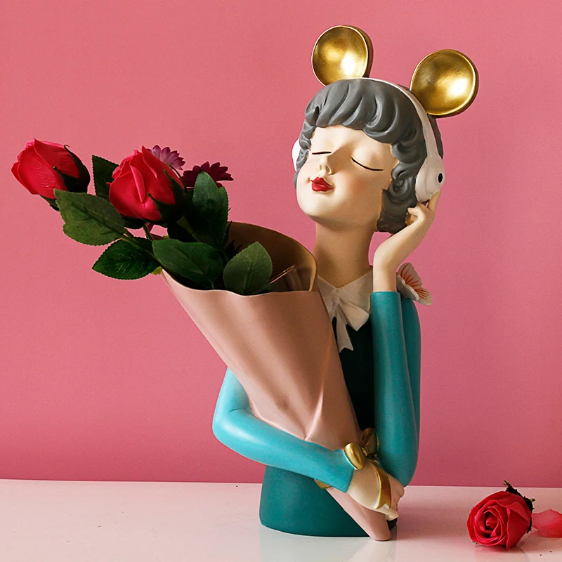 

Flower girl arranges flowers for her girlfriend's birthday present