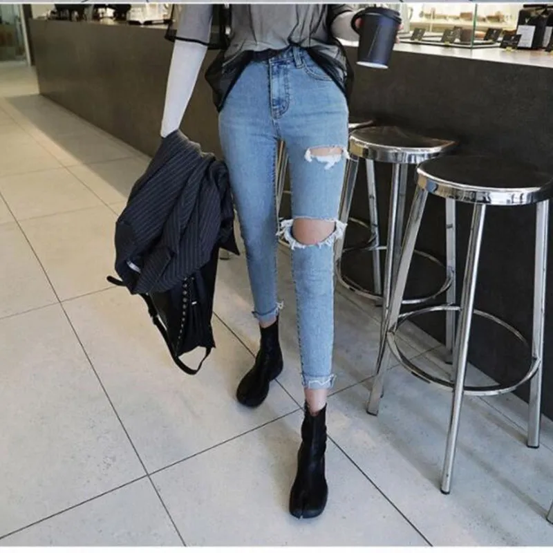 

Women's casual high waist feet nine points jeans 2019 Korean version of the autumn sexy hole design slim feet jeans