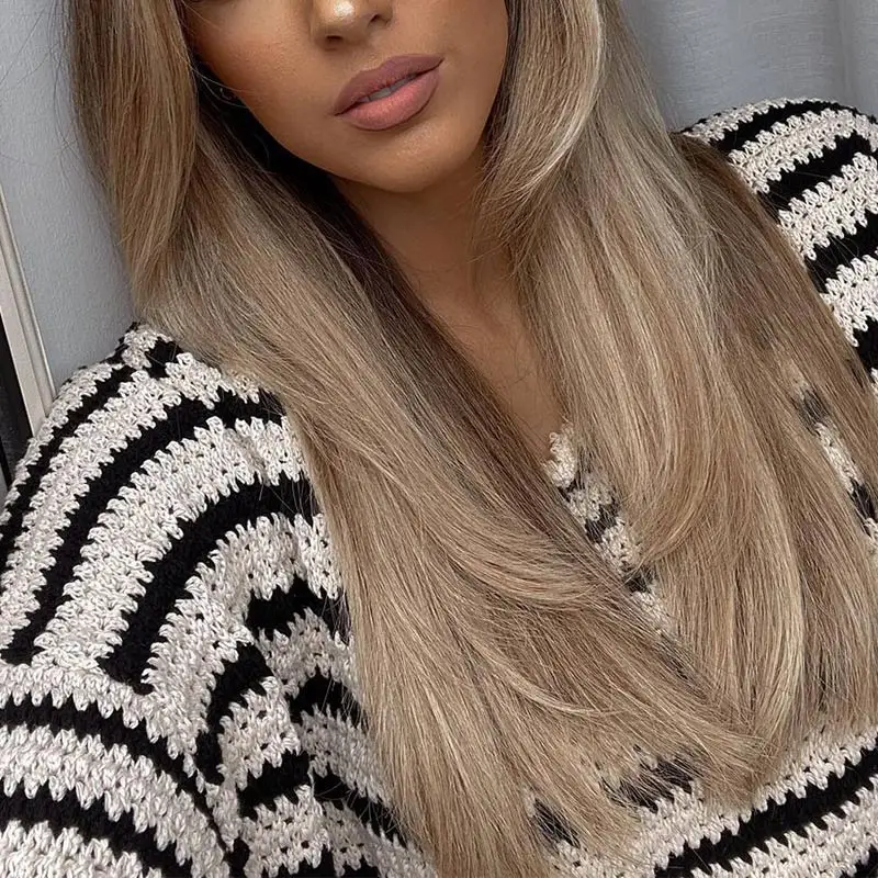 Женский трикотажный свитер в полоску с круглым вырезом и длинным рукавом |