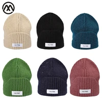 2021 high quality knitted hat beanie hat unisex winter outdoor outing warm hat solid color simple and customizable wholesale