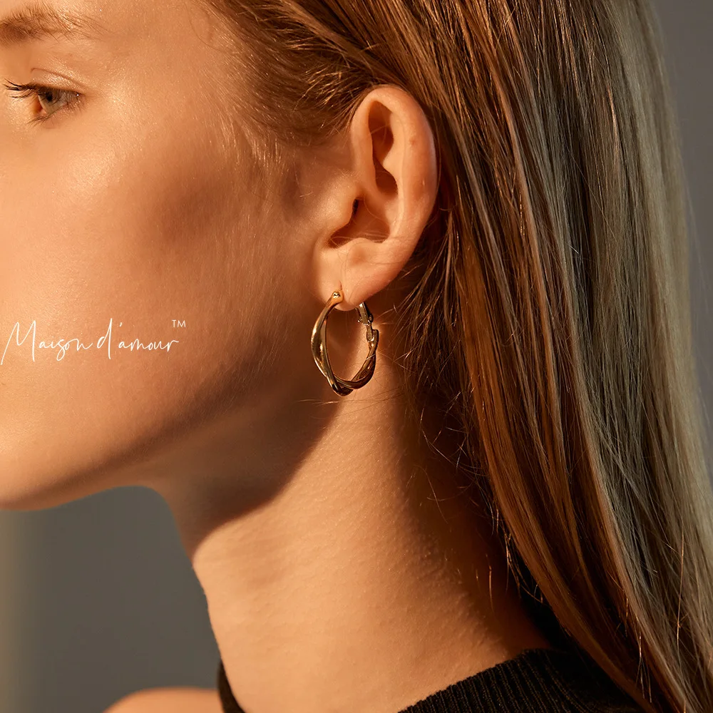 

Europe Hot French Street Style Gold Plating Twisted Simple Hoop Earrings