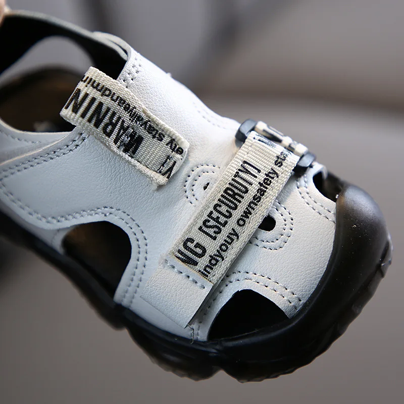 Сандалии для новорожденных мягкая нескользящая подошва 2 цвета черные белые