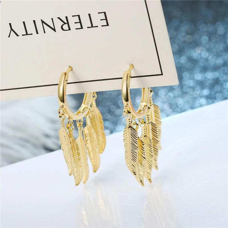 1 Пара винтажных золотых серег в форме перьев Европейские женщины уникальные модные многочисленные серьги на длинных листьях круглой формы ювелирных изделий.