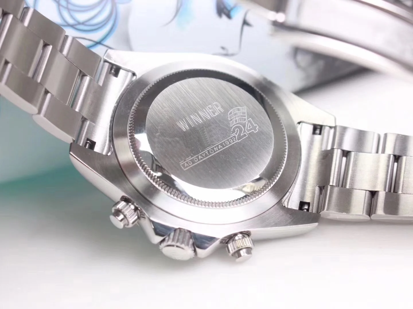 

Luxury Brand New Men Diamonds Stainless Steel Silver Arabic Numberals Baguette Bezel Glacier Blue Dial Quartz Chronograph Watch