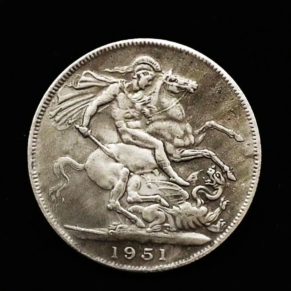 Коллекционные монеты из серебра и золота с изображением дракона в стиле Святого