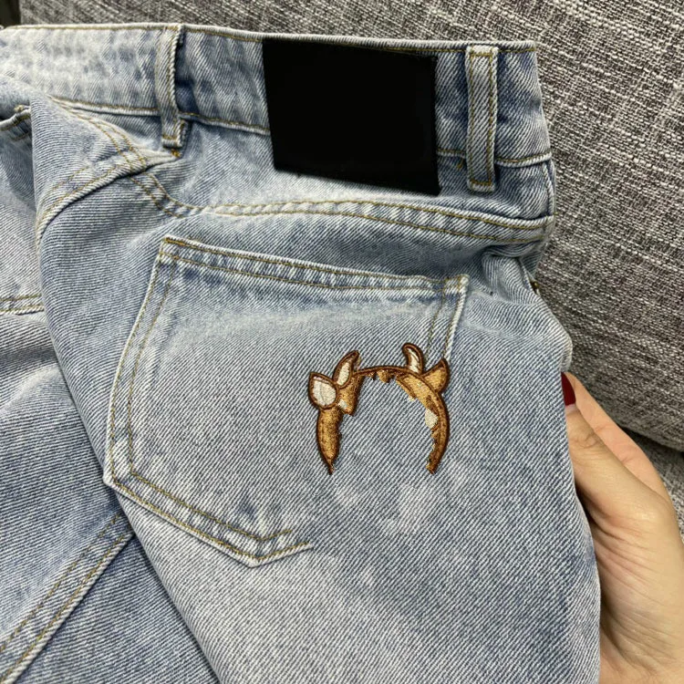 

Luxury Brand Denim Skirts Women 2021 New Spring Animal Embroidered High Waist Washed Embroidered Cartoon A-line Blue Jean Skirts