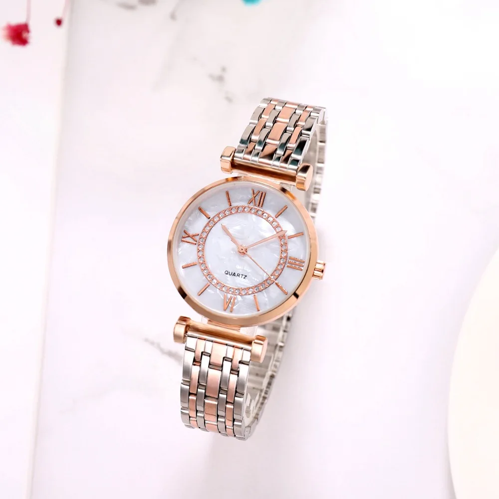 Женские часы из розового золота с кристаллами и сетчатым ремешком нержавеющей