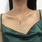 Ожерелье-чокер женское, металлическое, с зеленым кристаллом