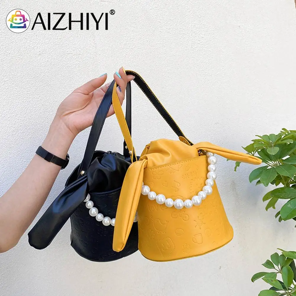 

Модная женская однотонная сумка через плечо из искусственной кожи с тиснением из мультфильма, повседневная женская сумка через плечо с жем...