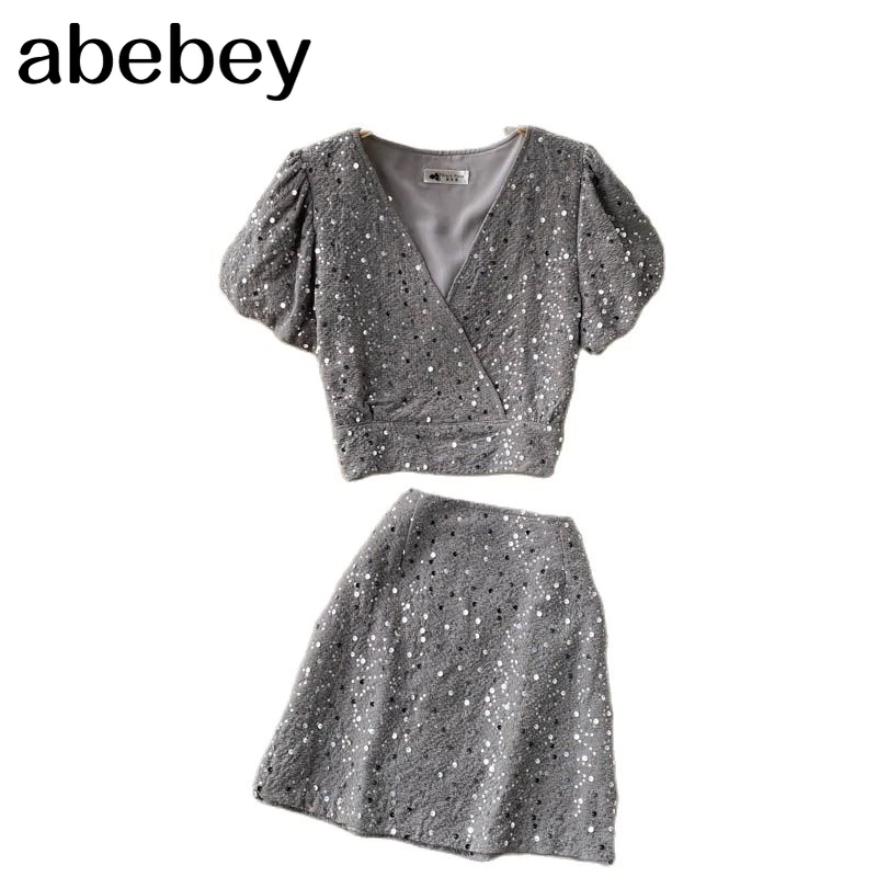 

Women Summer Fashion Shiny Sequins Set Puff Sleeve V Neck Short Tops+High Waist A-line Mini Skirt Two Piece Suits 2021