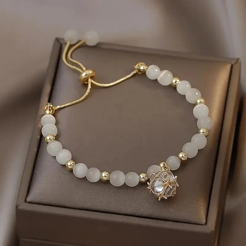 

Cat's eye stone girlfriends girls bracelet bracelet small public design simple hand decoration persimmon Ruyi hair Rope Bracelet