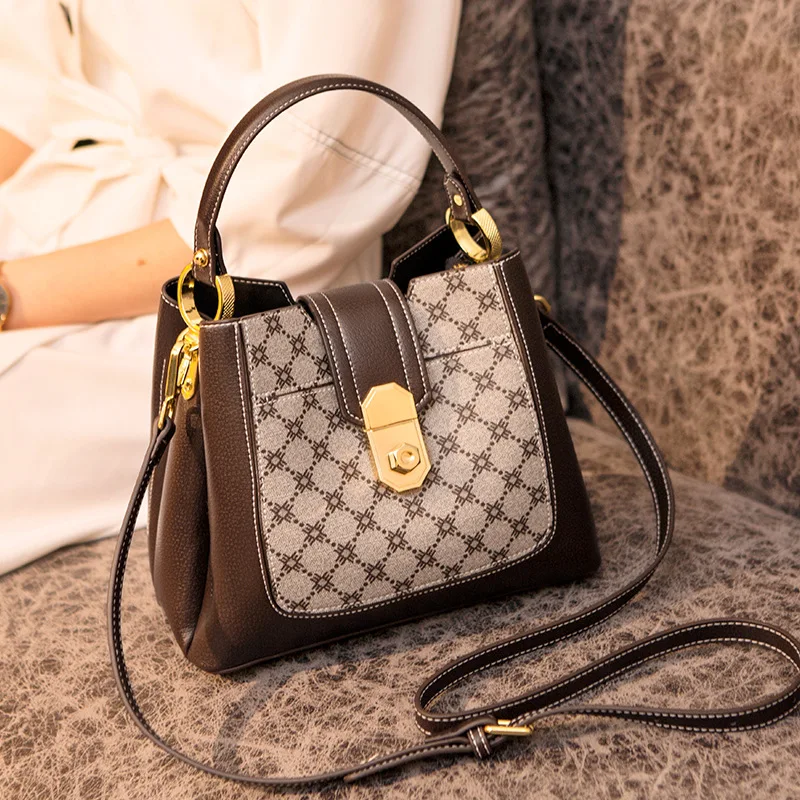 

Женские ведра из натуральной кожи, новинка 2021, модные вместительные винтажные сумки на одно плечо с замком, знаменитые дамские сумочки, сумк...