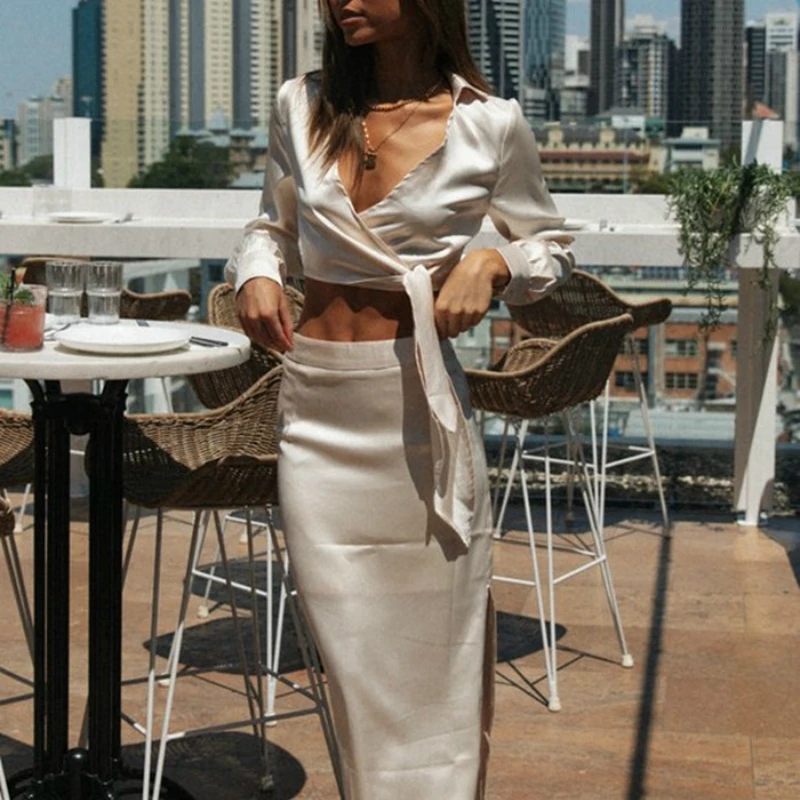 

Клубные пикантные Одежда для девочек; Сезон весна-осень; Новинка; Одежда с длинными рукавами, v-образный вырез, однотонная Цвет асимметрично...