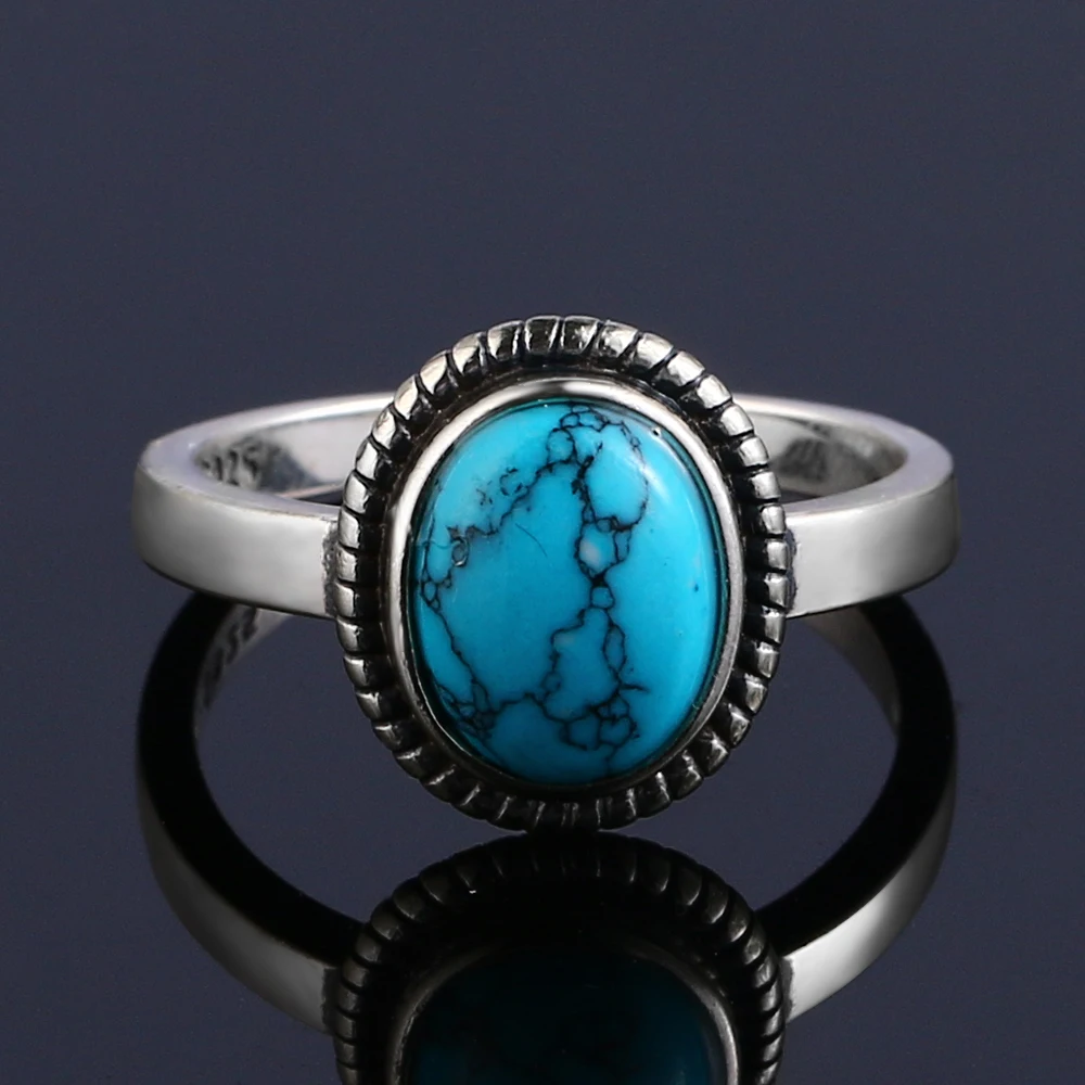 

Кольцо обручальное с натуральным бирюзовым камнем 8*10 мм