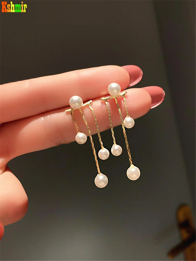 

Kshmir Korean fashion contracted tide earring pearl tassel eardrop temperament design sense earpiece girl jewelry gift 2021