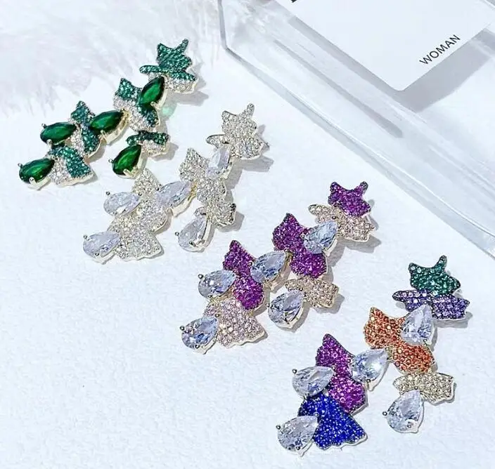 

Серьги-подвески женские в форме листьев, с микроинкрустацией из циркония