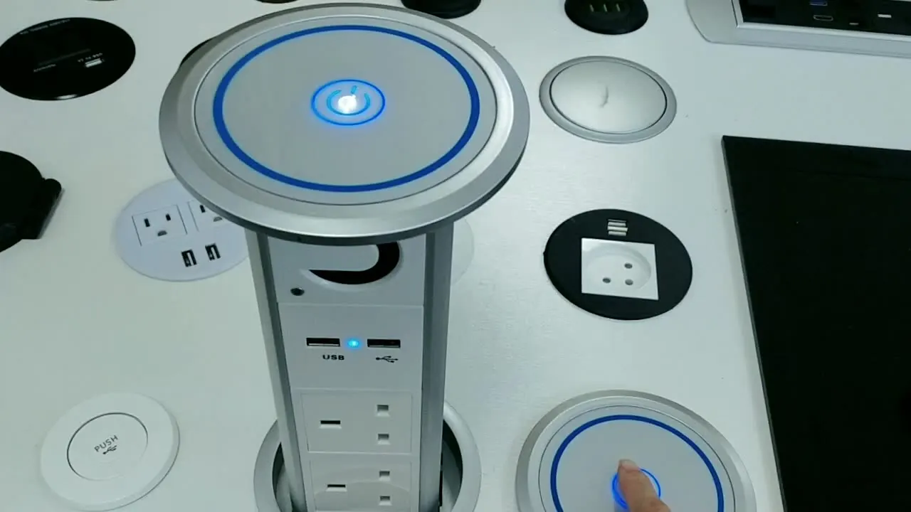 

Waterproof Intelligent Tabletop Motorized Pop up Kitchen UK Outlet Tower Socket with Speaker Qi Fast Wireless Charger