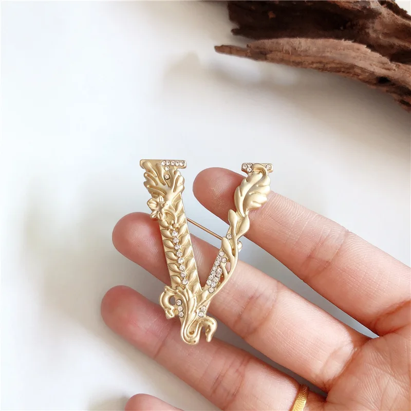 NEW Simple Design Boutique Golden Metal Rhinestone Phoenix Brooch Half Human Portrait Brooch for Women Party Jewelry