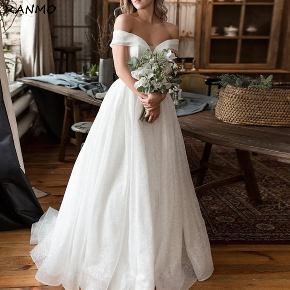 

Sparkle Tulle Princess Wedding Dresses Women robe de mariée Off the Shoulder Ball Gown Bride Dress Backless vestidos de fiesta