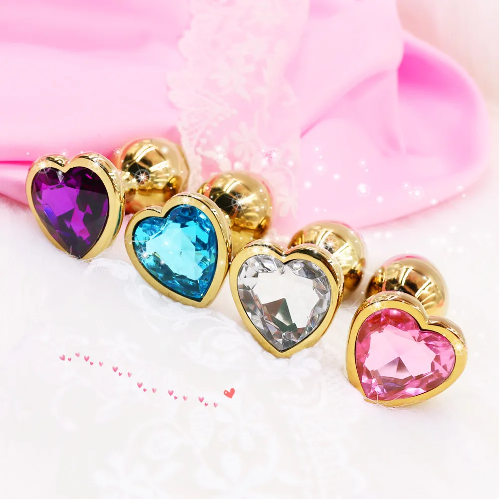 Анальная пробка с золотым металлическим розовым кристаллом в форме сердца