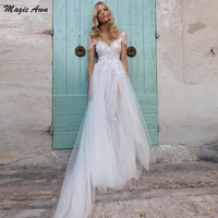 magic awn new beach wedding dresses lace appliques side split open back boho wedding party gowns cap sleeves a line robes mariee