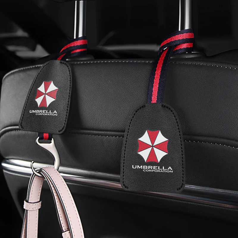 

1/2Pcs Leather Multifunction Hook Up Umbrella Corporation Emblem Car Seat Back Hooks For Audi Toyota Peugeot Suzuki Citroen Fiat