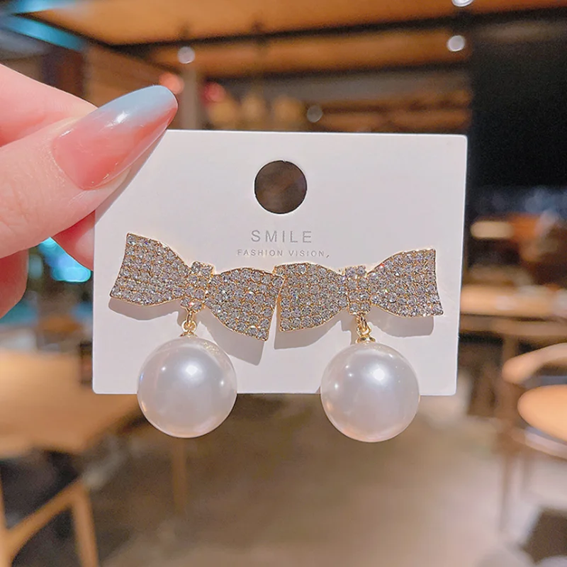 

Full Diamond Bow Earrings Female Large Pearl Personality Temperament Earrings