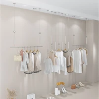 womens clothing store shelf display rack on the wall hanging hanger stainless steel wire drawing hanger