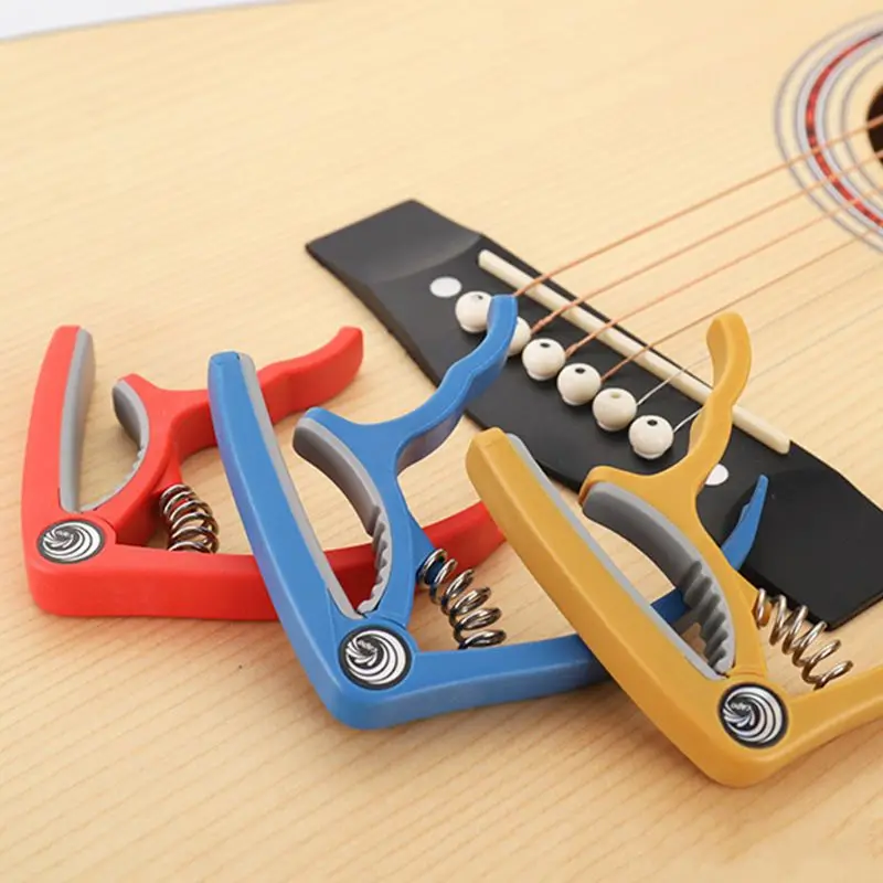 

Plastic Steel Guitar Capo Classical Acoustic Guitar Ukulele Tuning Clamp