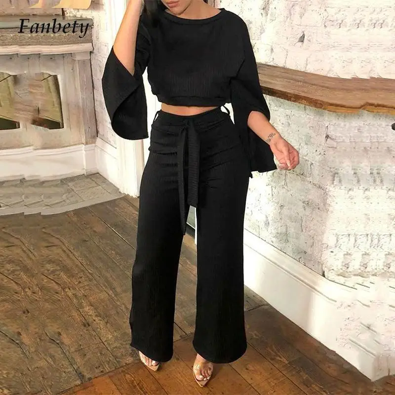 

Женский трикотажный костюм в рубчик, осенне-зимний однотонный костюм из двух предметов, Топ с длинным рукавом и круглым вырезом и брюки на ш...