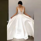 Современные изящные трапециевидные Свадебные платья цвета слоновой кости с кружевной аппликацией, сексуальные свадебные платья с глубоким v-образным вырезом для невесты без рукавов