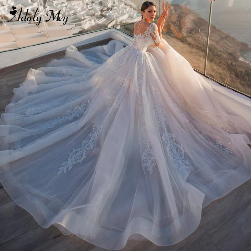 Роскошное свадебное платье-трапеция Adoly Mey с аппликациями и бисером иллюзией на