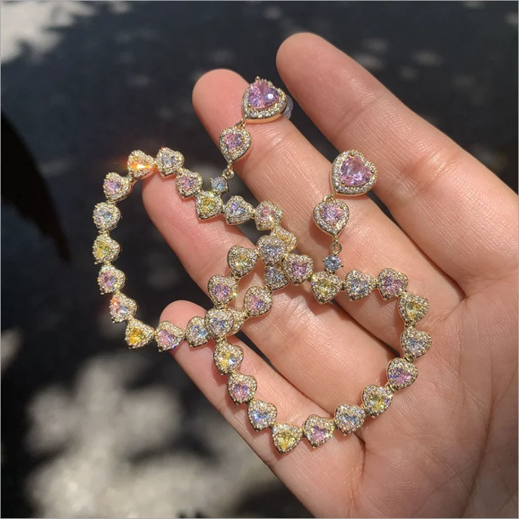 

Gradient love earrings exaggerated temperament super flash micro-inlaid zircon S925 silver needle exaggerated girl heart earring
