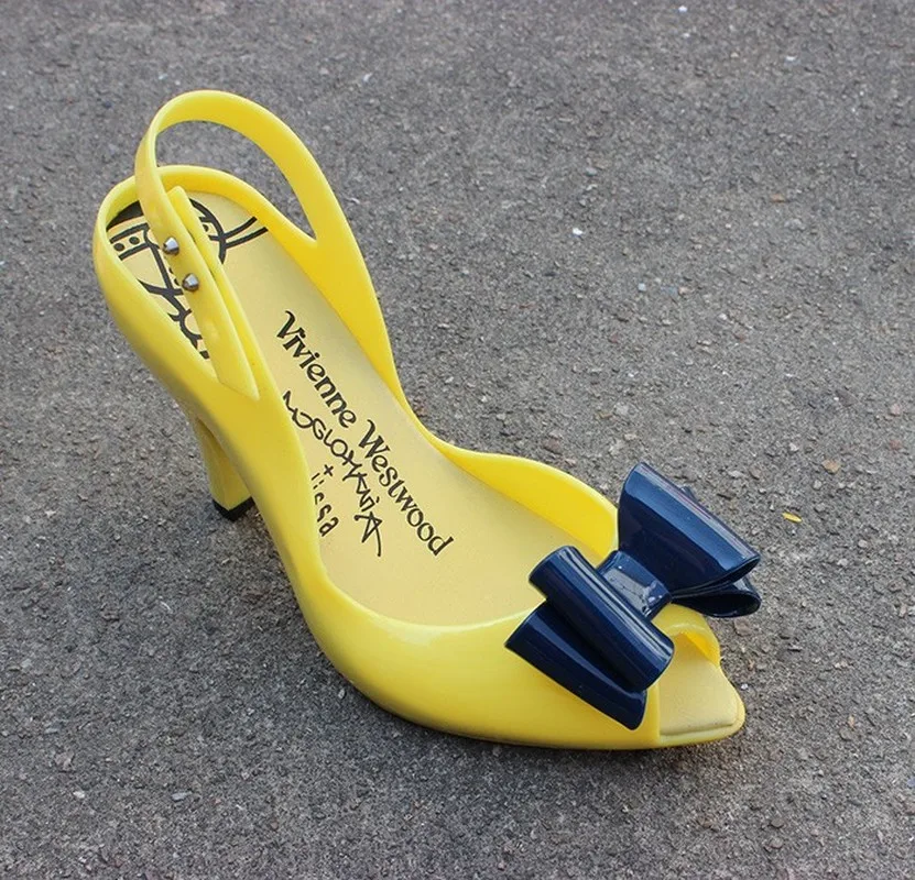 Женские туфли лодочки на высоком каблуке с открытым носком и украшением в виде