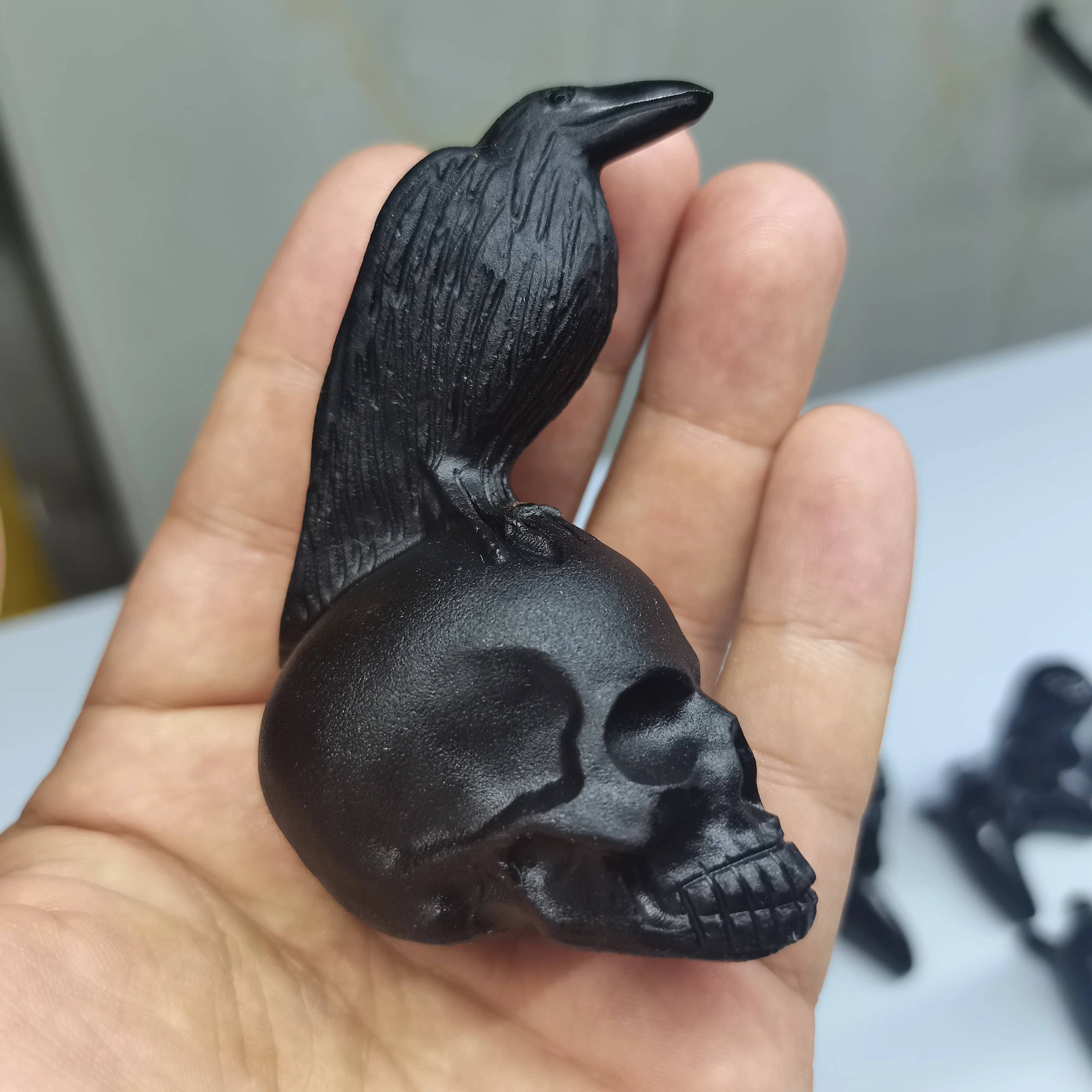 

Natural Stone Black Obsidian Handmade Carved Skull Crow Powerful Statue For Home Decoration Gift