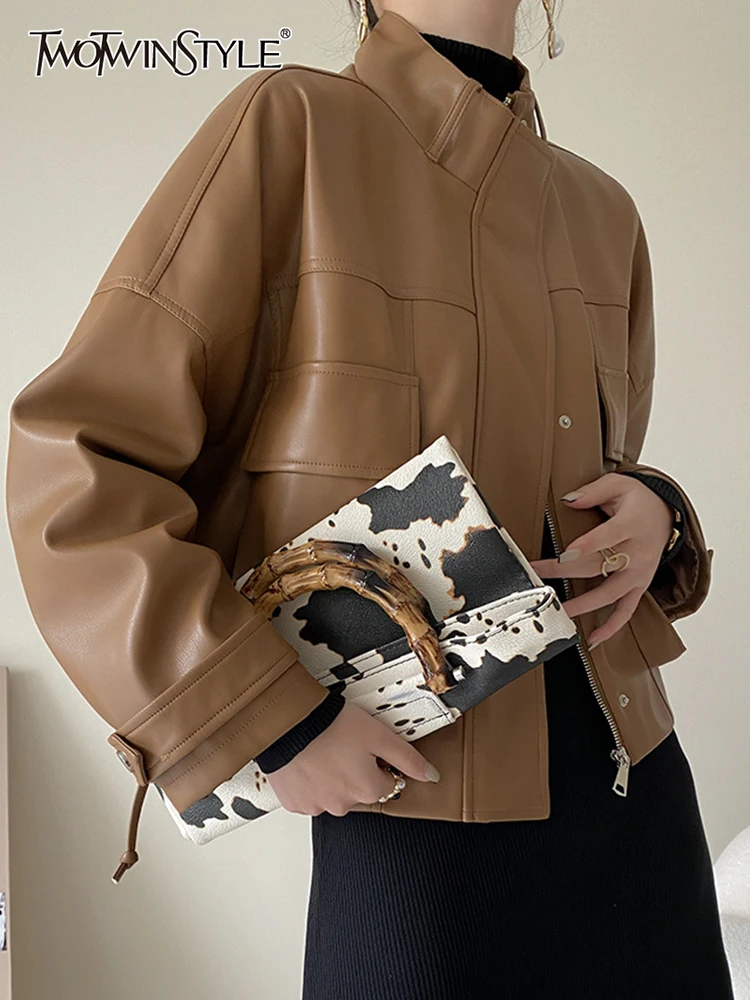 

TWOTWINSTYLE High Street Pu Jackets For Women Stand Collar Loose Long Sleeve Zipper Patchwork Pockets Coats Female 2021 Autumn