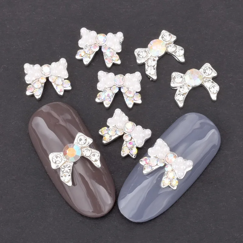 10pcs Strass 3d Nail Bow Tie AB White Rhinestone Pearl Design Nail Art Decoration Glamour Silver Alloy Jewelry Nail QB028-029
