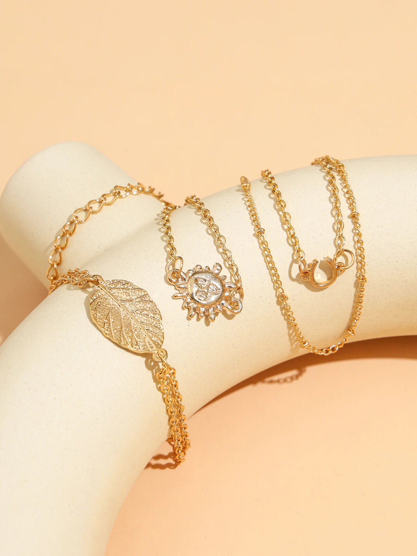 

4Pcs Metal Gold Bohemia Punk Sun Leaves Bracelet for Women Multi Layer Chains Set Plant Tassel Gift Fashion Jewelry Accessories